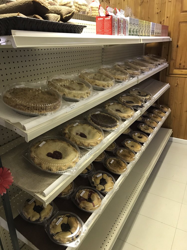 Shelves lined with rows of fresh homemade pies at Fehr's Heritage Bakery